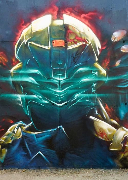 Mural de Dead Space con personaje futurista y graffiti profesional
