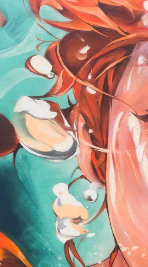 Graffiti de La Sirenita en fachada pública de L’Ametlla del Mar , Cataluña