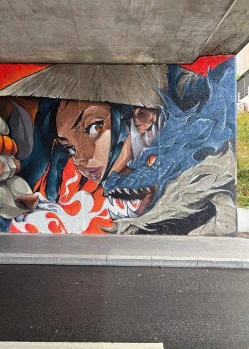 Mural urbano de samurái y dragón pintado en festival CapsAttack en París