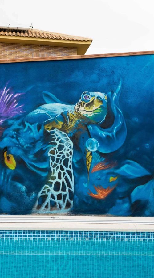 Graffiti de fauna marina en piscina particular en Madrid