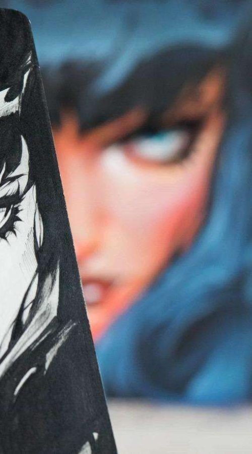 Retrato de mujer en mural de graffiti hiperrealista