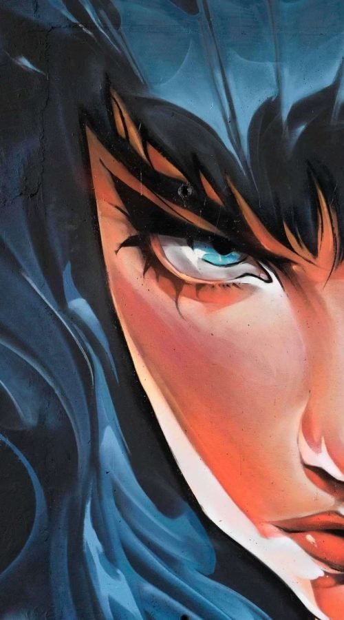 Retrato de mujer en mural de graffiti hiperrealista