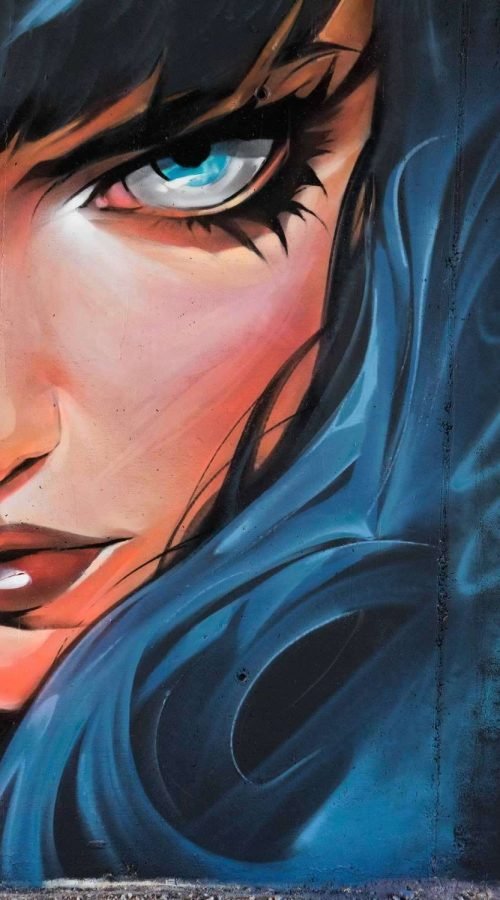 Retrato de mujer en mural de graffiti hiperrealista